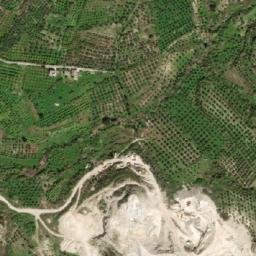 Satellite imagery of Ḩarf ash Shammūţ, SY