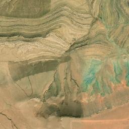 Satellite imagery of Rdjem Theniet es Sadra, DZ