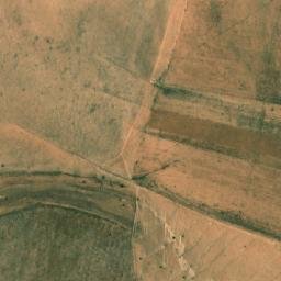 Satellite imagery of Rdjem Theniet es Sadra, DZ
