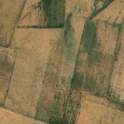 Satellite imagery of Rdjem Theniet es Sadra, DZ