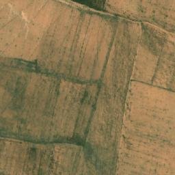 Satellite imagery of Rdjem Theniet es Sadra, DZ