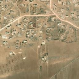 Satellite imagery of Rujm as Sirā‘, SY