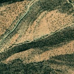 Satellite imagery of Râs er Reg, DZ