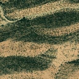 Satellite imagery of Râs er Reg, DZ