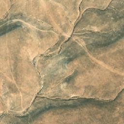 Satellite imagery of Ţaraq Şawwānat al Ḩasw, SY