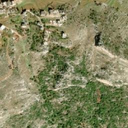 Satellite imagery of Harf Jim el Benn, LB