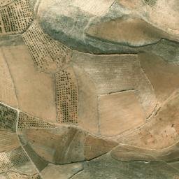 Satellite imagery of Z̧ahr al Wasţānī, SY