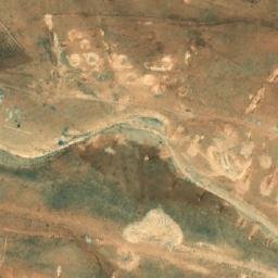 Satellite imagery of Ḩarf Abū al Hawā, SY