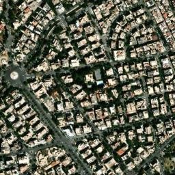 Satellite imagery of Qaşr aḑ Ḑiyāfah, SY