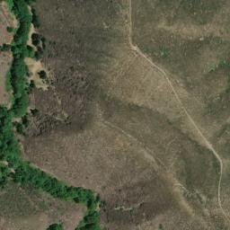 Satellite imagery of Poorman Mine, US