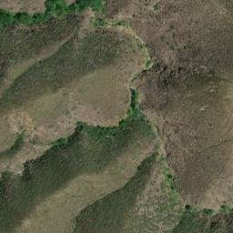 Satellite imagery of Poorman Mine, US