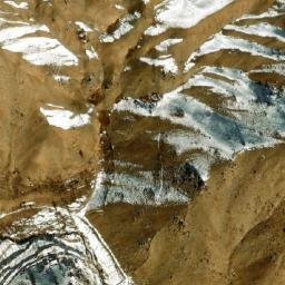 Satellite imagery of Ghūnḏī-ye Garm Āwak, AF