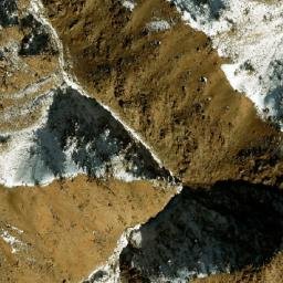 Satellite imagery of Ghūnḏī-ye Garm Āwak, AF