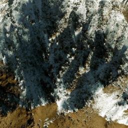 Satellite imagery of Ghūnḏī-ye Garm Āwak, AF
