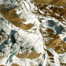 Satellite imagery of Ghūnḏī-ye Garm Āwak, AF