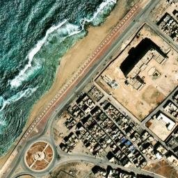 Satellite imagery of Ra’s Khuraybīsh, LY
