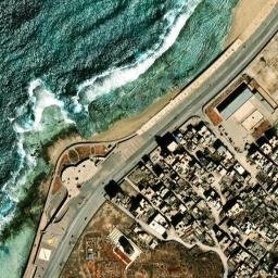 Satellite imagery of Ra’s Khuraybīsh, LY