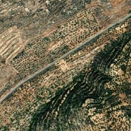 Satellite imagery of Bi’r al Kharā’ib, PS