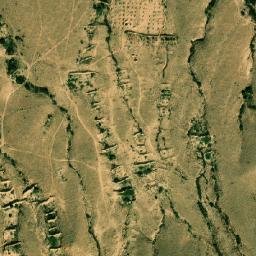 Satellite imagery of Ra’s al Mu‘allaq, LY