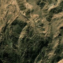 Satellite imagery of Khashm Umm Qurād, LY