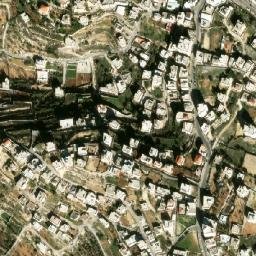 Satellite imagery of Maghārat az Zuqā‘ah, PS