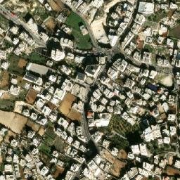 Satellite imagery of Maghārat az Zuqā‘ah, PS