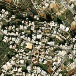 Satellite imagery of Maghārat az Zuqā‘ah, PS