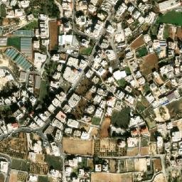 Satellite imagery of Maghārat az Zuqā‘ah, PS