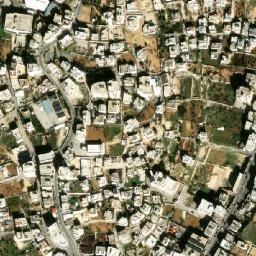 Satellite imagery of Maghārat az Zuqā‘ah, PS