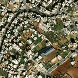 Satellite imagery of Maghārat az Zuqā‘ah, PS