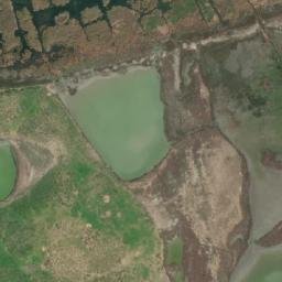 Satellite imagery of Al Kawm al Akhḑar, EG