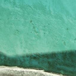 Satellite imagery of Ra’s Qirţās, QA