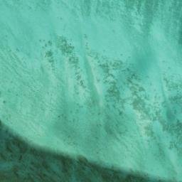 Satellite imagery of Ra’s Qirţās, QA