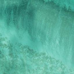 Satellite imagery of Ra’s Qirţās, QA