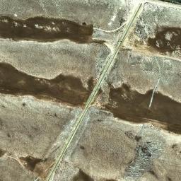 Satellite imagery of Ra’s Qirţās, QA