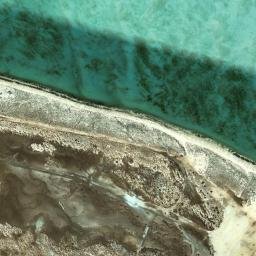 Satellite imagery of Ra’s Qirţās, QA