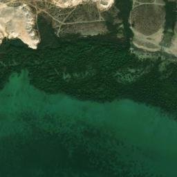 Satellite imagery of Ra’s Umm ‘Abdah, QA