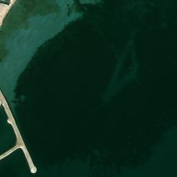 Satellite imagery of Ra’s al Maţbakh, QA