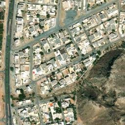 Satellite imagery of Jabal Ḑadnā, AE