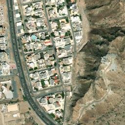Satellite imagery of Jabal Ḑadnā, AE