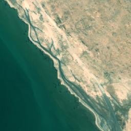 Satellite imagery of Ra’s Zikrīt, QA