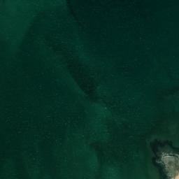 Satellite imagery of Ra’s Zikrīt, QA