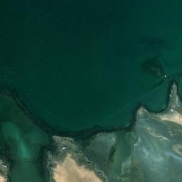 Satellite imagery of Ra’s Zikrīt, QA