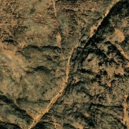 Satellite imagery of Jabal Taqīshī, DZ