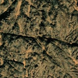Satellite imagery of Jabal Taqīshī, DZ