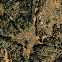 Satellite imagery of Jabal Taqīshī, DZ