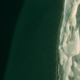 Satellite imagery of Ra’s al Maḩārif, QA