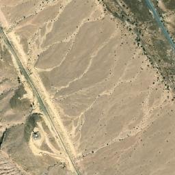 Satellite imagery of Jabal Mathmūmah, AE