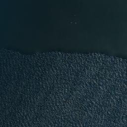 Satellite imagery of Pelotes Rock, PH