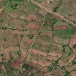 Satellite imagery of Boundary point 6: Heap of earth 9ft high on east of caravan road from Shirati to Karungu, KE